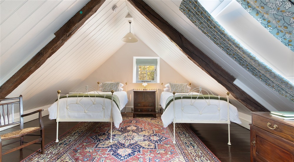 The first-floor twin bedroom in the eaves of Abermydyr, Ceredigion at Abermydyr in Aberaeron, Ceredigion