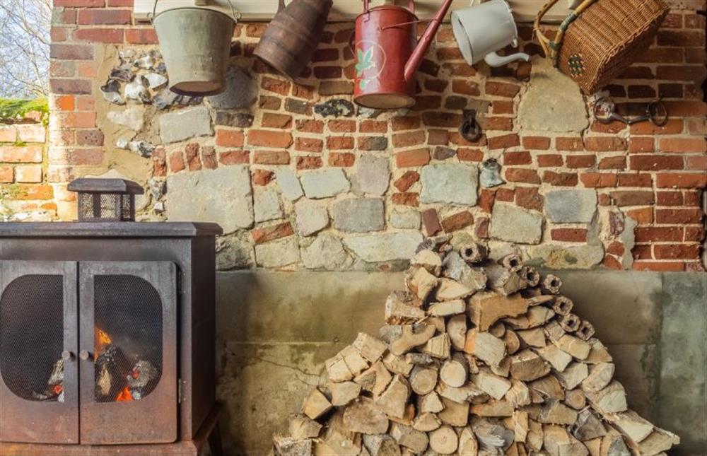 Outside: The cosy wood burning stove in the outside barn at Able Stables, East Rudham near Kings Lynn