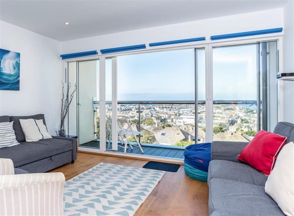 Comfortable living area with access to the balcony at Above Towan @ 8 Quay Court in , Newquay