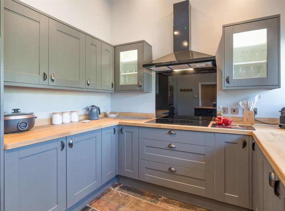 Well-equipped fitted kitchen at Abrahams Cottage in Langthwaite, near Leyburn, North Yorkshire