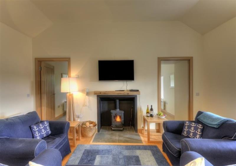 Relax in the living area at Achaglachgach Cottage, Tarbert