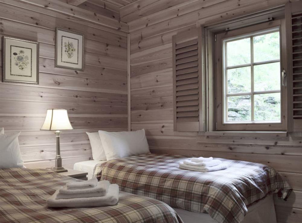 Cosy bedroom with twin beds at Maple, 