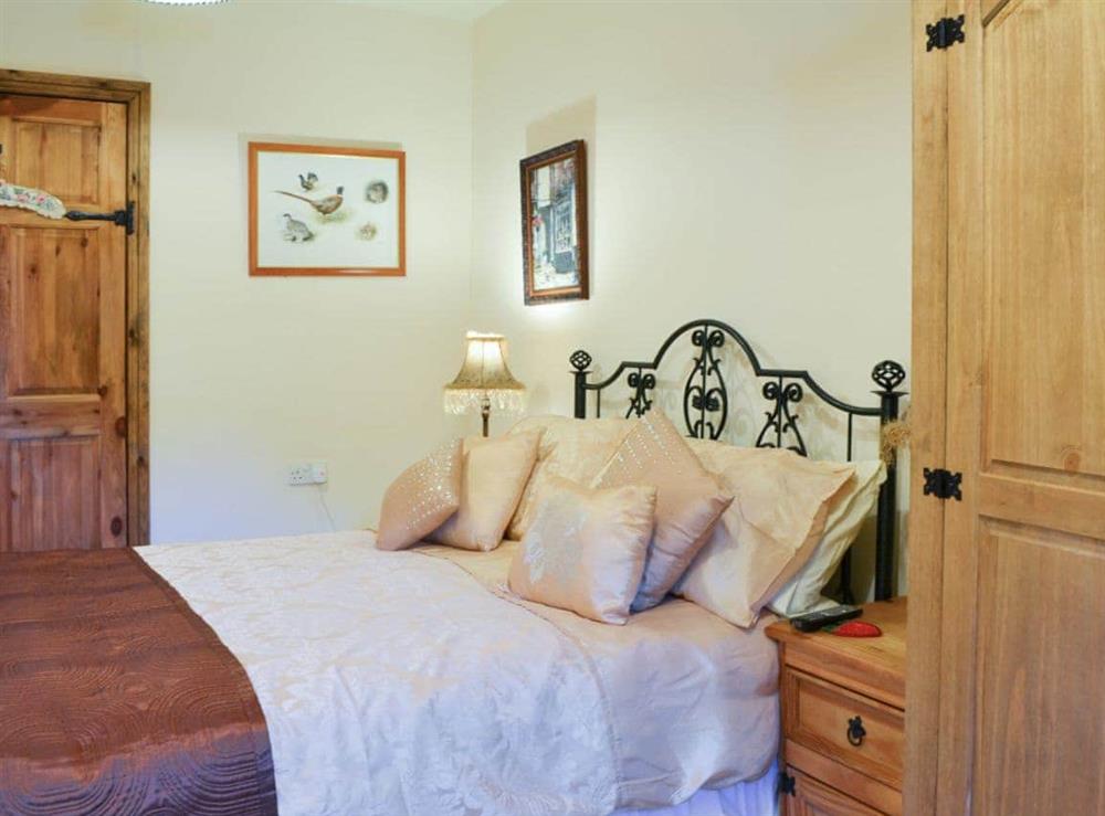 Comfortable and romantic double bedroom at Acorn Barn in Laytham, near York, North Yorkshire