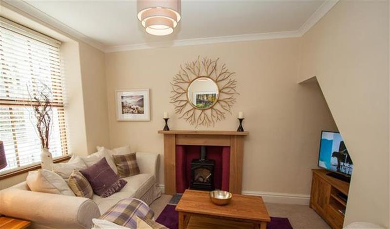 Relax in the living area at Acorn Cottage, Ambleside