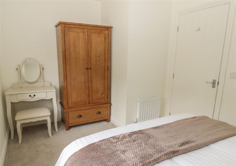 A bedroom in Acorn Cottage at Acorn Cottage, Longframlington