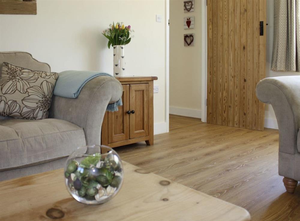 Tastefully furnished living room at Acorn Cottage in North Perrott, near Crewkerne, Somerset