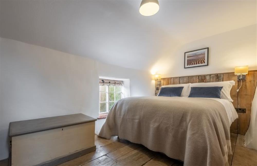 First floor: Bedroom two with double bed at Acorn Cottage, Tattersett near Kings Lynn
