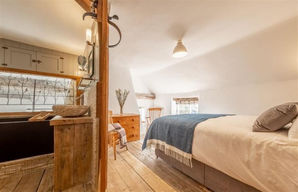 First floor: Through to the master bedroom en-suite at Acorn Cottage, Tattersett near Kings Lynn
