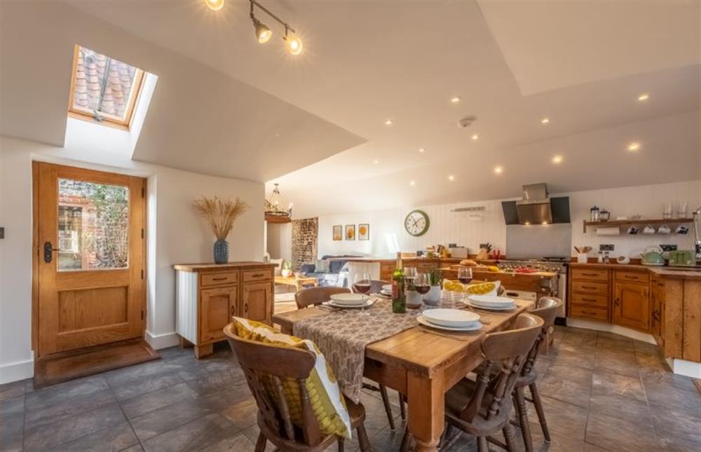 Ground floor:  A view of the dining area and kitchen at Acorn Cottage, Tattersett near Kings Lynn