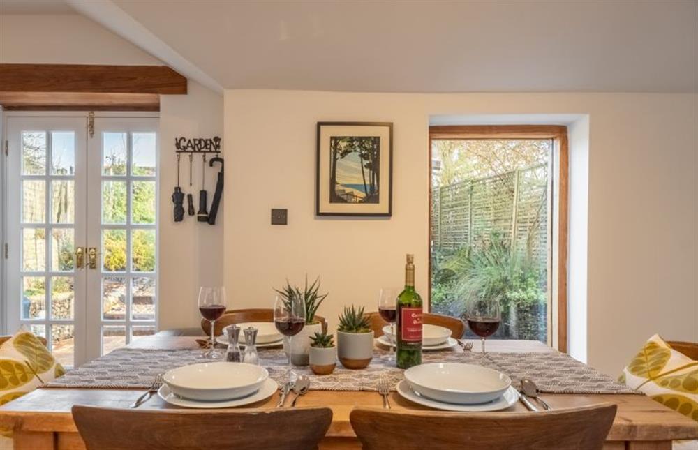 Ground floor: Dining table with views over the garden at Acorn Cottage, Tattersett near Kings Lynn