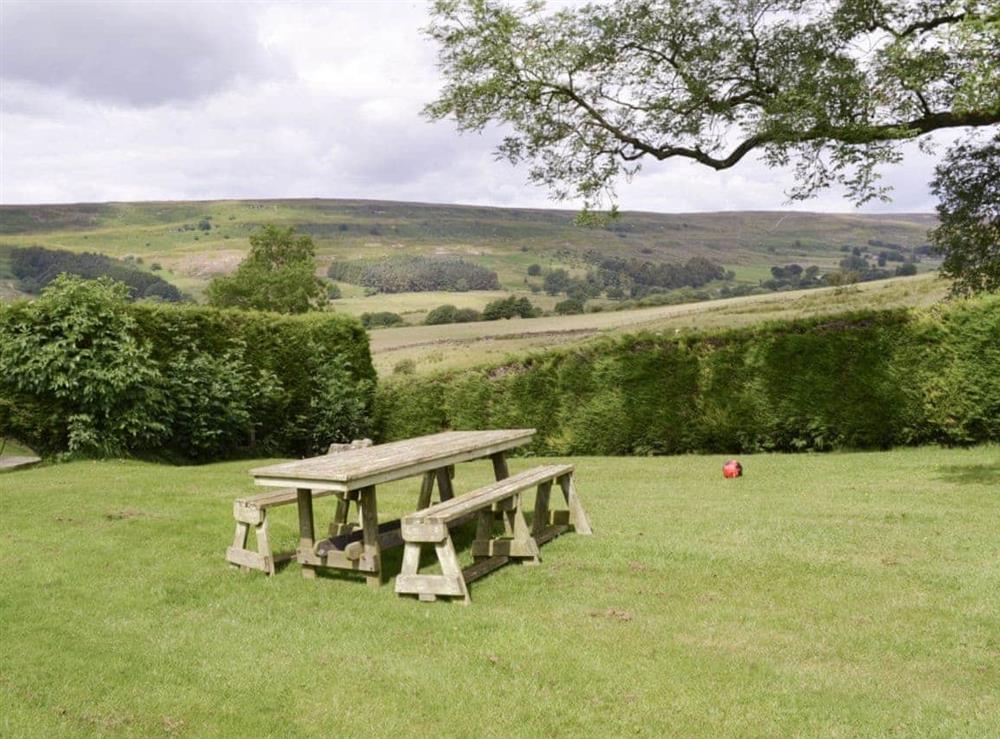 Shared lawned area with outdoor furniture at Adagio in Rosedale, near Pickering, North Yorkshire
