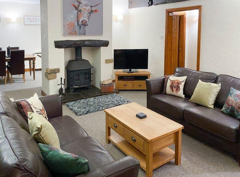 Welcoming living area with wood burner at Adagio in Rosedale, near Pickering, North Yorkshire