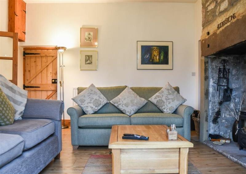 Relax in the living area at Adderstone Cottage, Belford