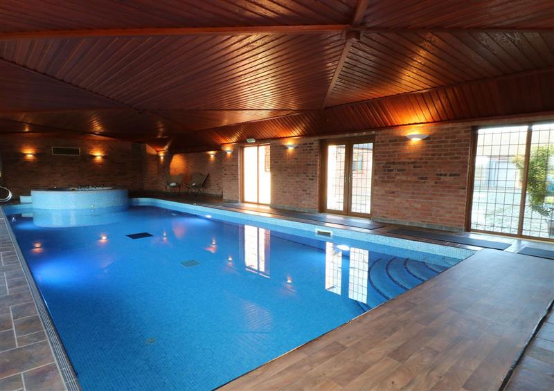 Enjoy the swimming pool at Adelaide Cottage, Snelston near Rocester