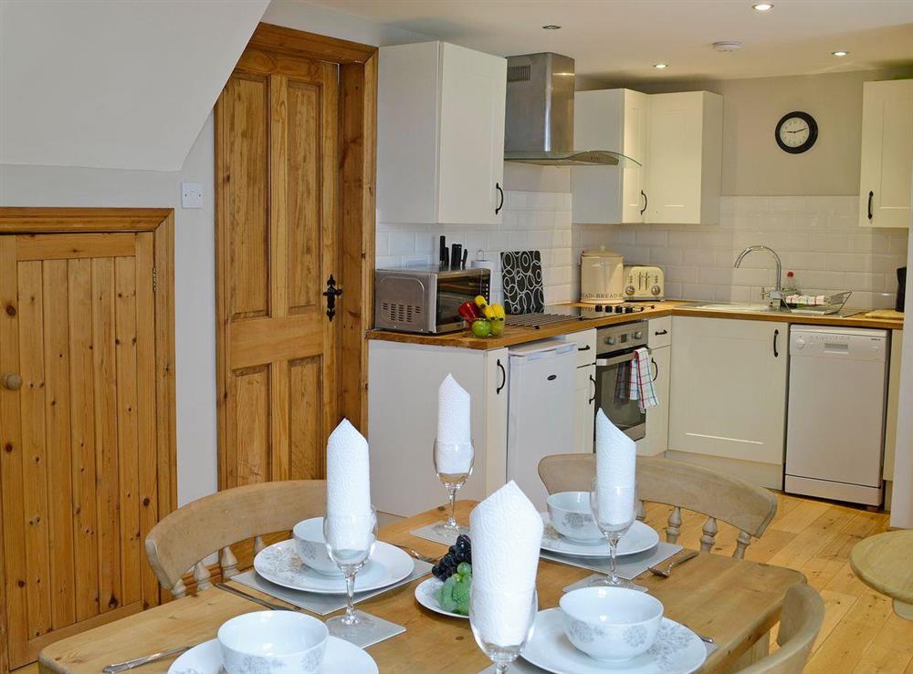 Beautifully presented dining area at Aden Barn in Allonby, near Silloth, Cumbria, England