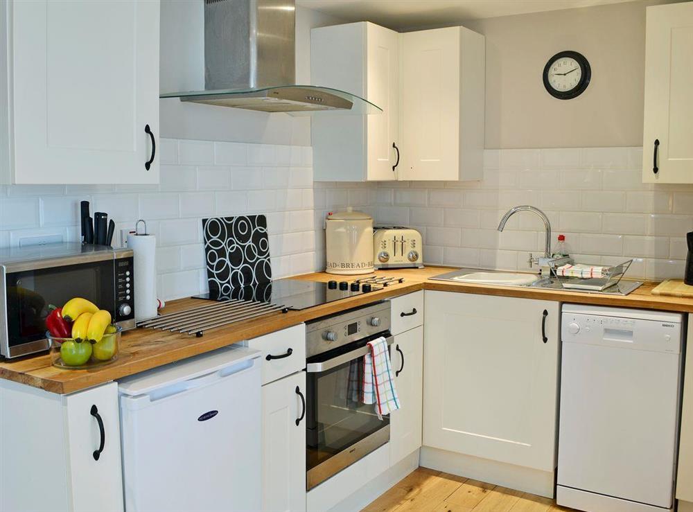 Modern style kitchen area at Aden Barn in Allonby, near Silloth, Cumbria, England
