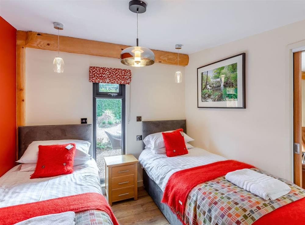 Twin bedroom at Afon Gam Lodge in Llangadfan, Powys