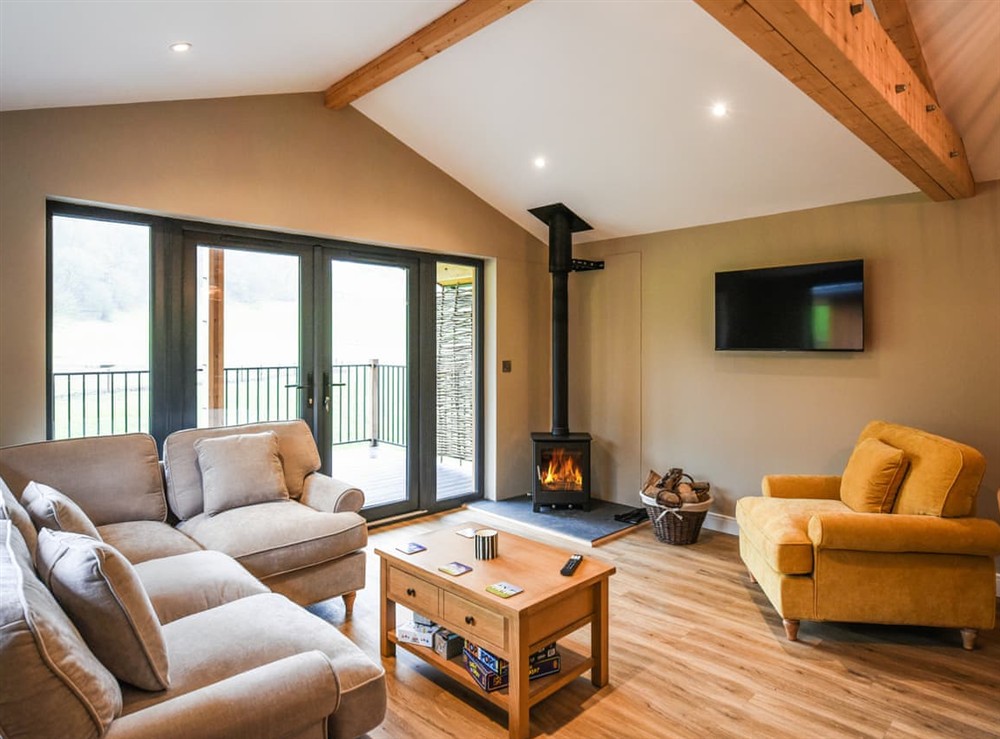 Open plan living space at Afon Lodge in Welshpool, Powys