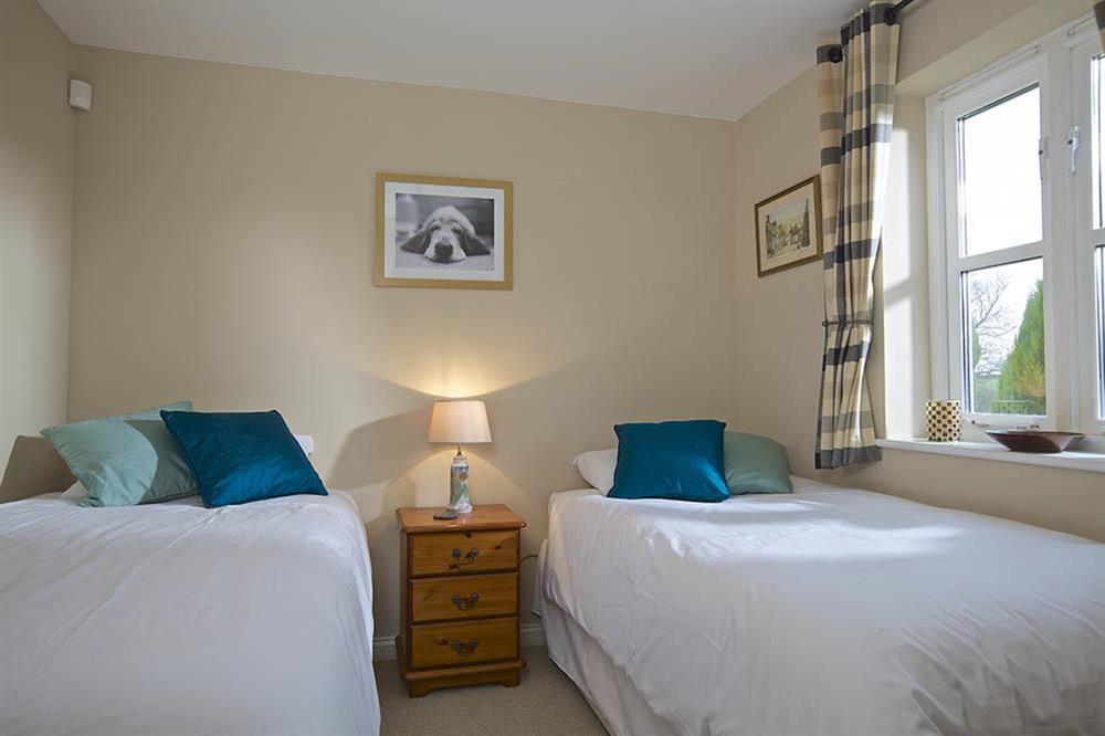Twin bedroom on the ground floor at Aft Cottage in , Kingswear