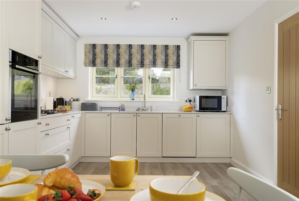 Light and airy well-equipped kitchen at Agatha Bear Cottage, Stow-on-the-Wold