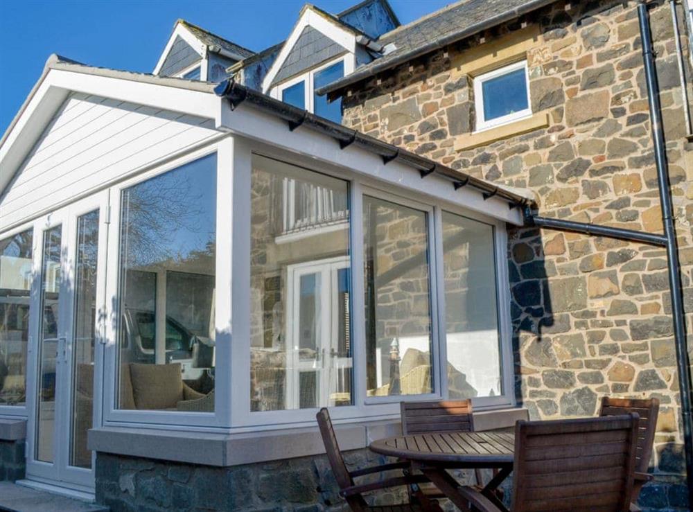 Delightful holiday home with patio area at Aidan Cottage in Craster, Alnwick, Northumberland