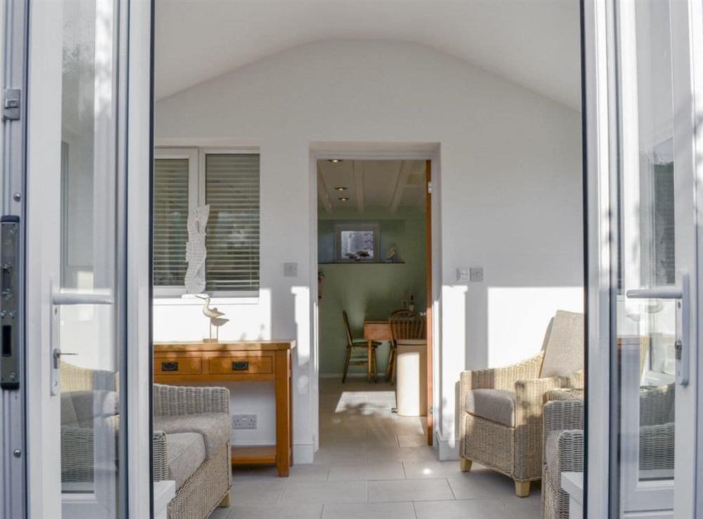 Light and airy conservatory at Aidan Cottage in Craster, Alnwick, Northumberland