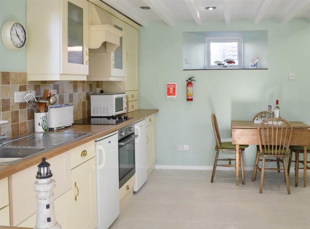 Well equipped kitchen/ dining area at Aidan Cottage in Craster, Alnwick, Northumberland