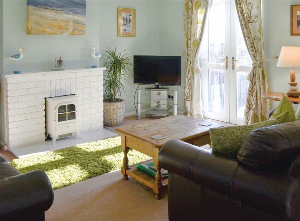 Well presented living area at Aidan Cottage in Craster, Alnwick, Northumberland