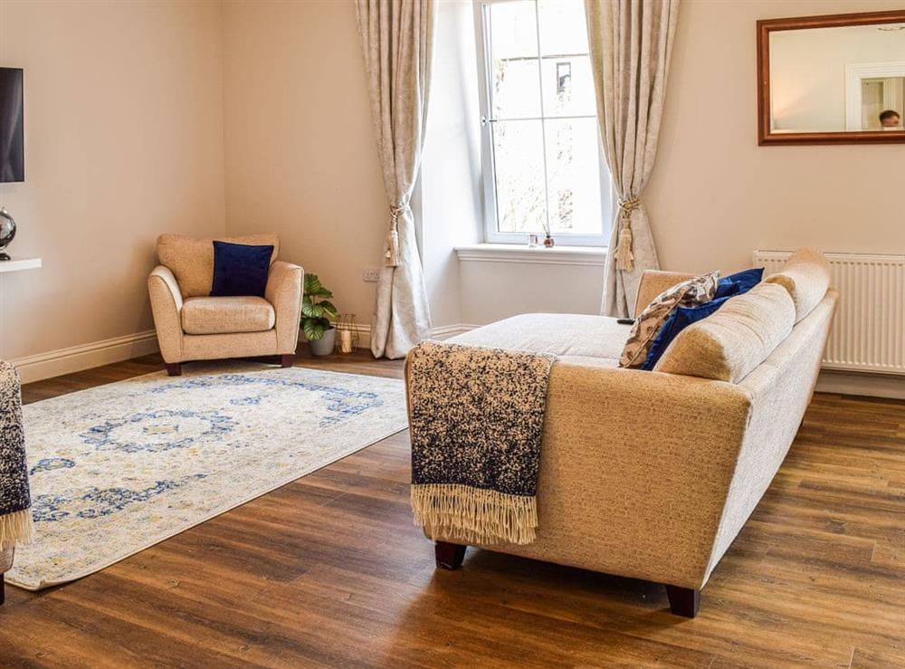 Open plan living space at Airds Apartment in Oban, Argyll