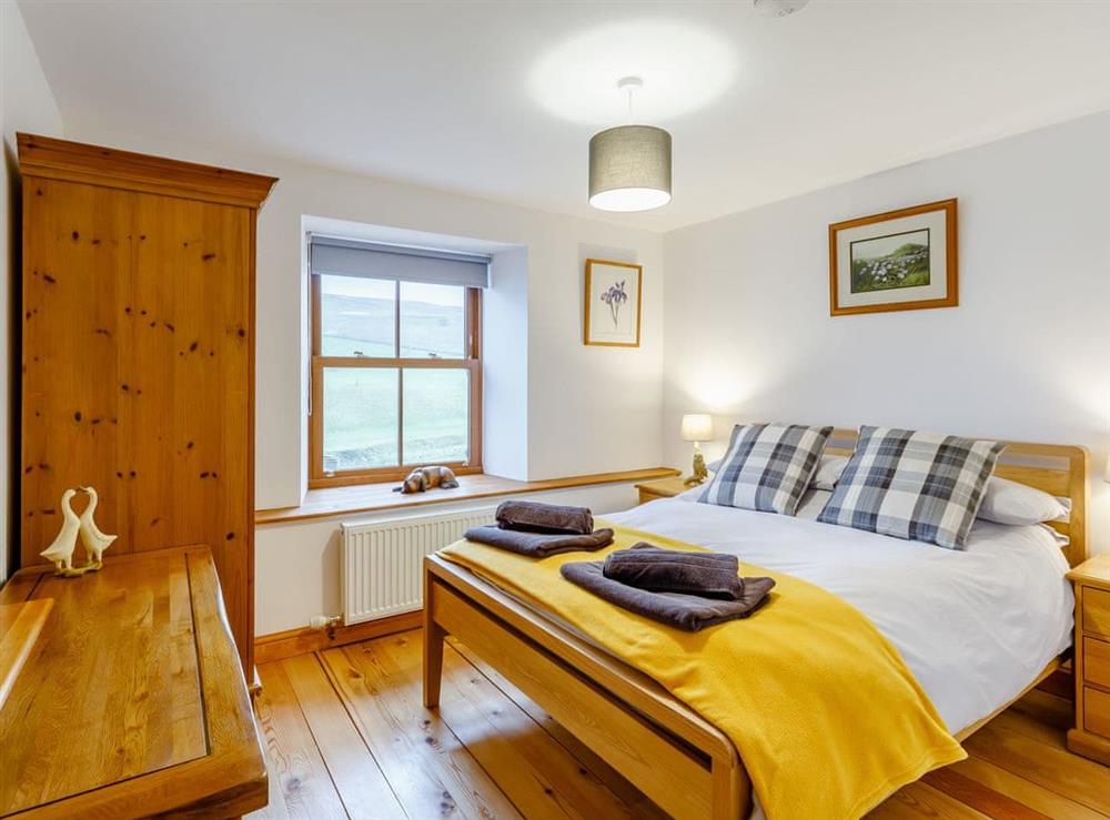 Double bedroom at Aisgill Farm Cottage in Aisgill, near Kirkby Stephen, Cumbria