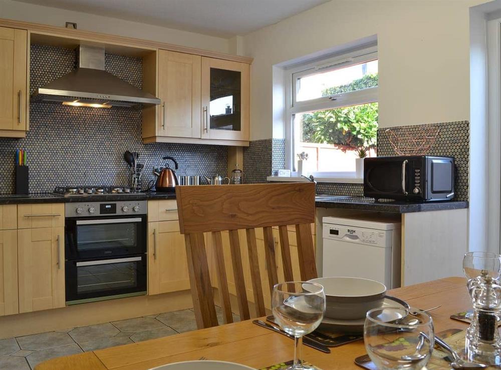 Kitchen and dining area at Alans Cottage in Cockermouth, Cumbria