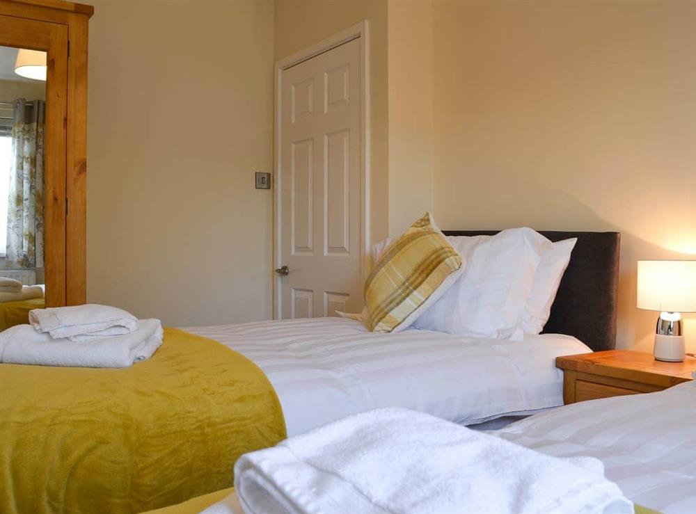 Twin bedroom at Alans Cottage in Cockermouth, Cumbria