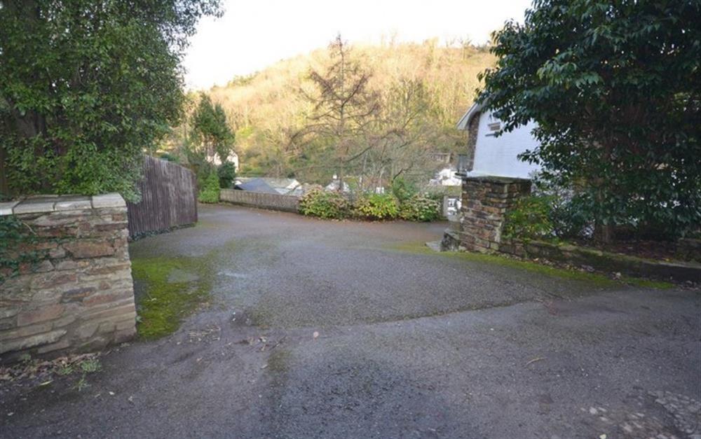 The driveway with ample parking.