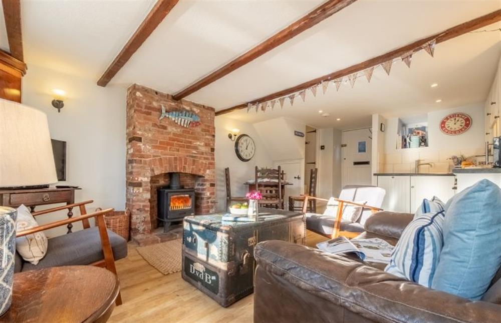 Albertfts Cottage: Sitting area with a log burner and plenty of seating