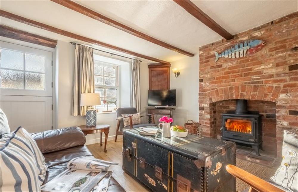 Albertfts Cottage: Sitting area with a log burner and plenty of seating