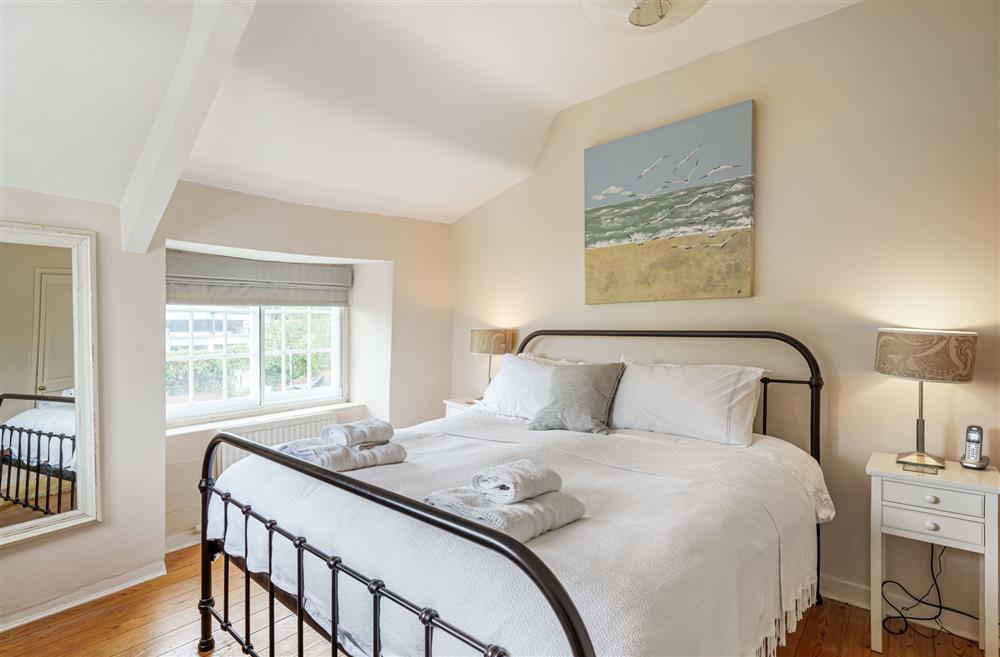 Bedroom one with a king-size bed at Albury House, Charmouth