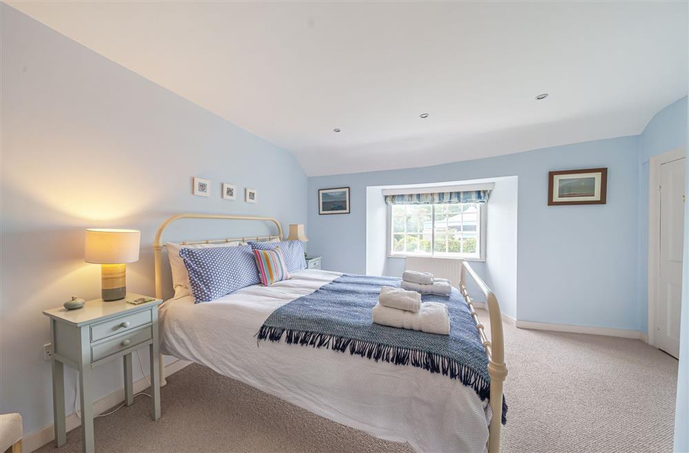 Bedroom three with a king-size bed at Albury House, Charmouth