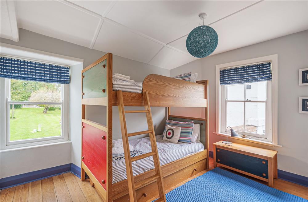 Bedroom two with cabin-style single bunk beds at Albury House, Charmouth
