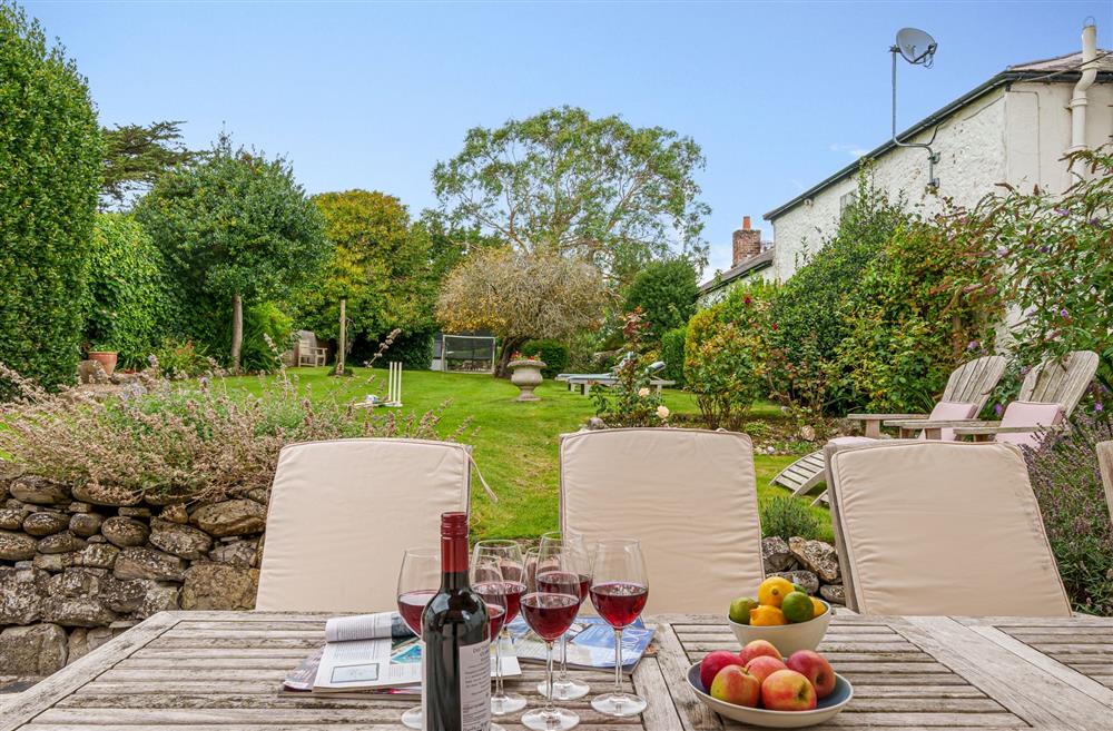 Dine alfresco with generous garden furniture at Albury House, Charmouth