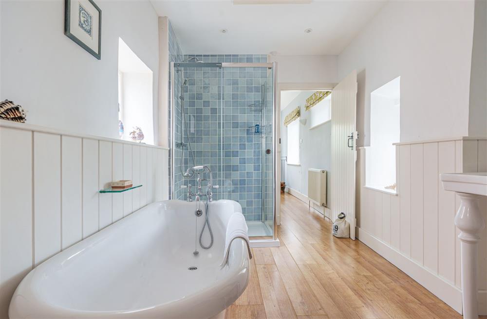 The family bathroom with a roll top bath at Albury House, Charmouth
