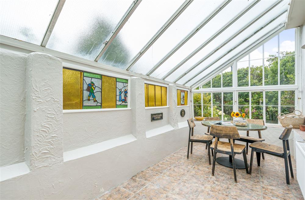 The light and airy conservatory at Albury House, Charmouth