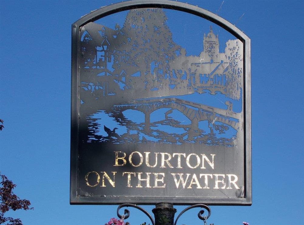 Bourton on the water village sign at Alderley House in Bourton-on-the-Water, Gloucestershire