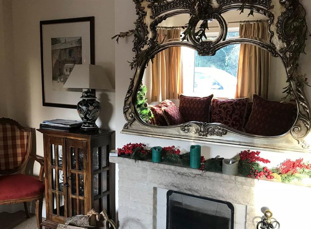 Living area with festive decoration at Alderley House in Bourton-on-the-Water, Gloucestershire