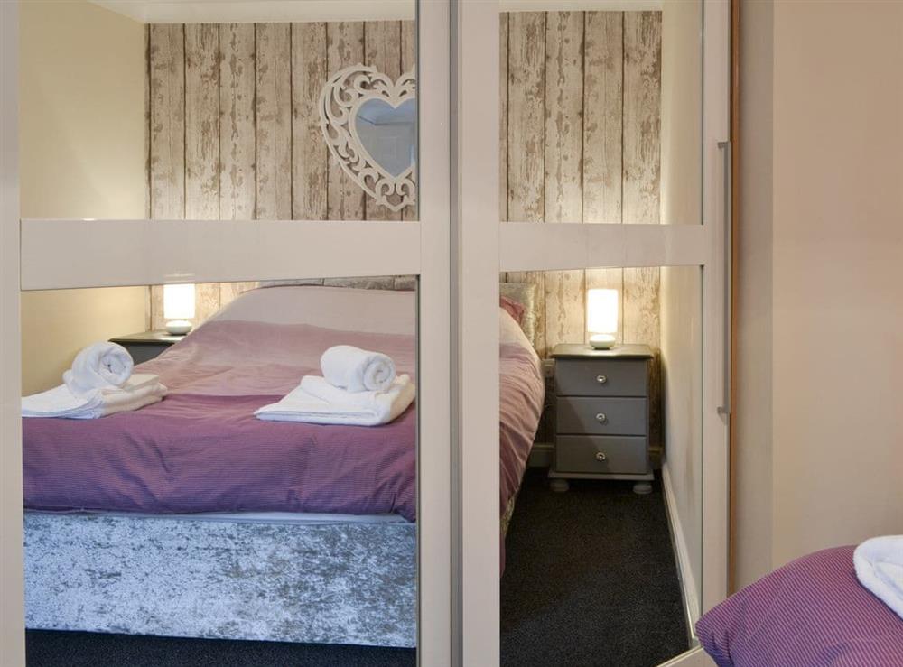 Mirrored storage within the double bedroom at Alderson Mews in North Frodingham, near Driffield, North Humberside