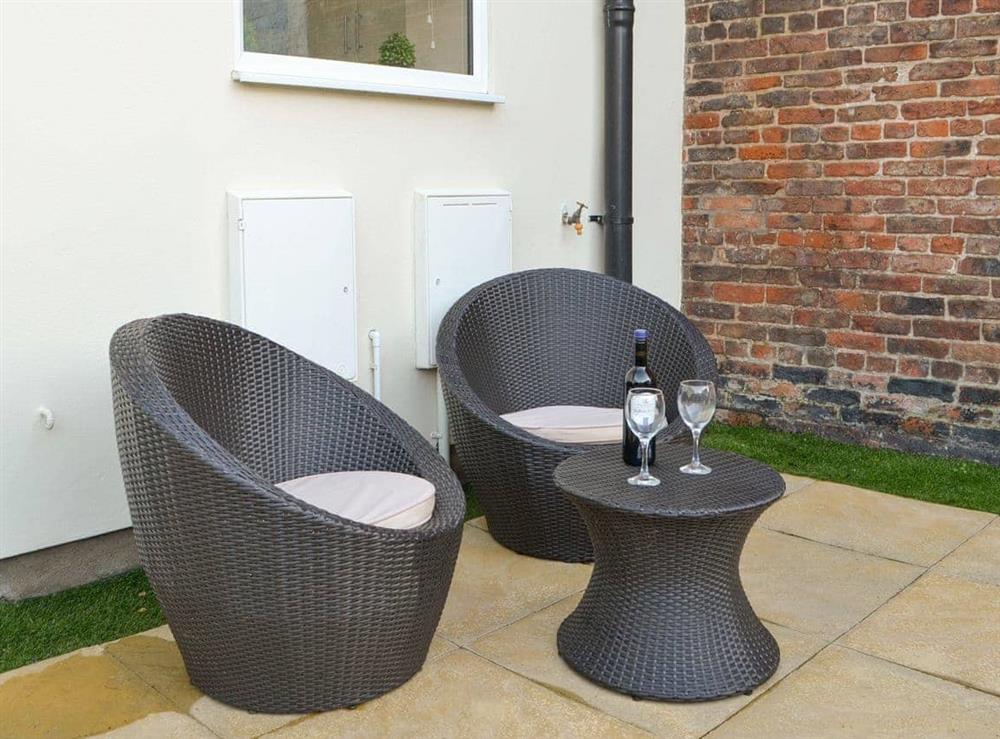 Outdoor seating area on the patio at Alderson Mews in North Frodingham, near Driffield, North Humberside