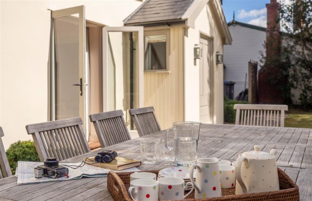 Outdoor space with table and chairs at Alexander House, Thorpeness