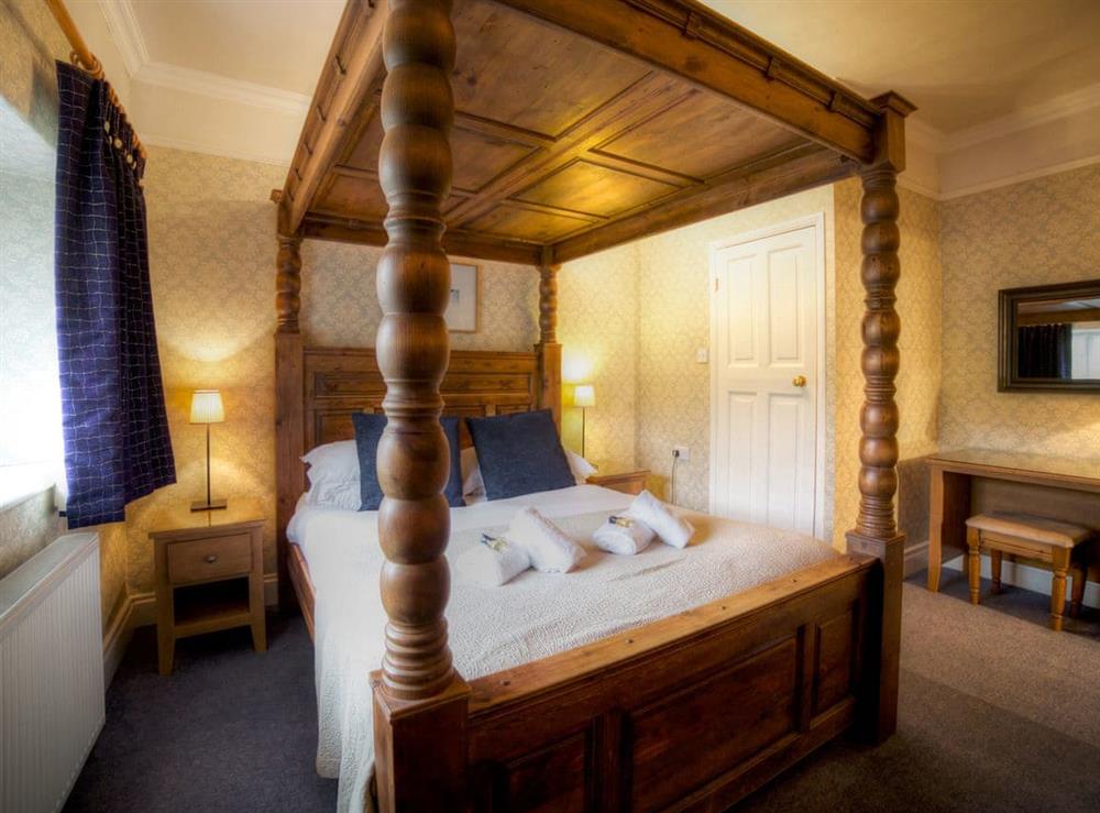 Four Poster bedroom at Alice Howe in Windermere, Cumbria