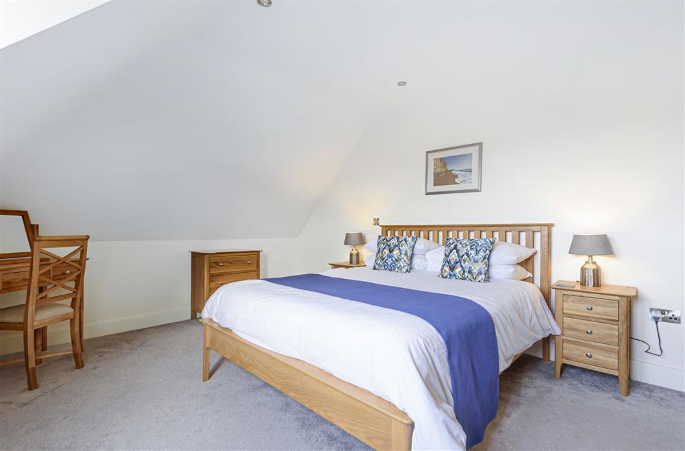 All Views, Dorset: Bedroom one with a 6ft super-king size bed and en-suite shower room at All Views, Bridport