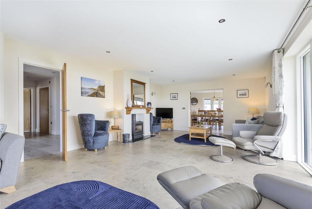 All Views, Dorset: The bright sitting room with relaxed seating  at All Views, Bridport