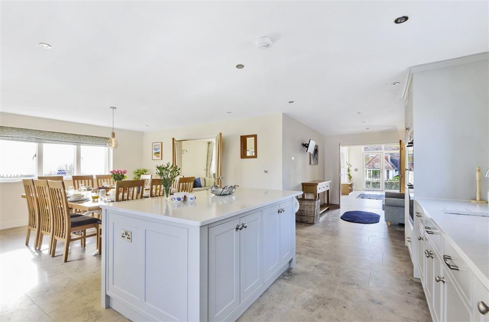 All Views, Dorset: The kitchen island and open-plan dining room at All Views, Bridport